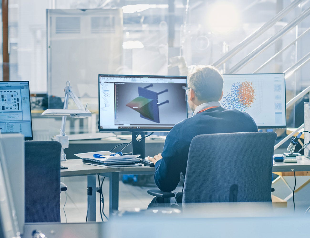 Image of a Leviat engineer in front of a computer